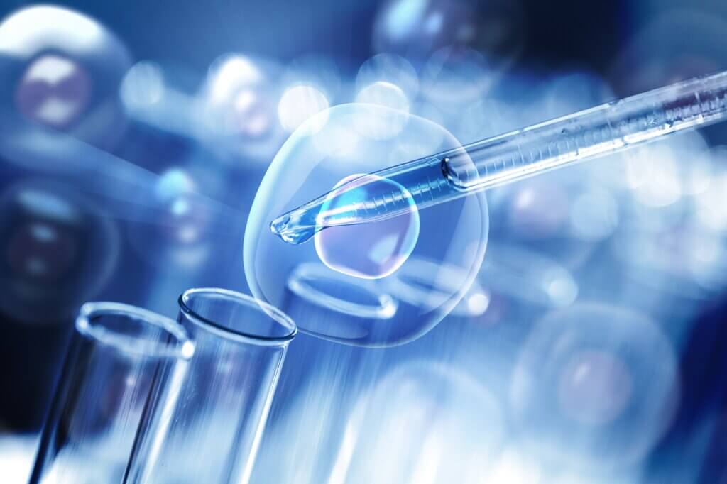 Laboratory tubes with pipette close up illustration of microscopic cells